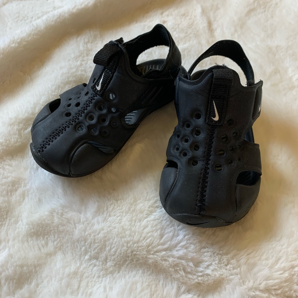 All black Nike Slip on sandal